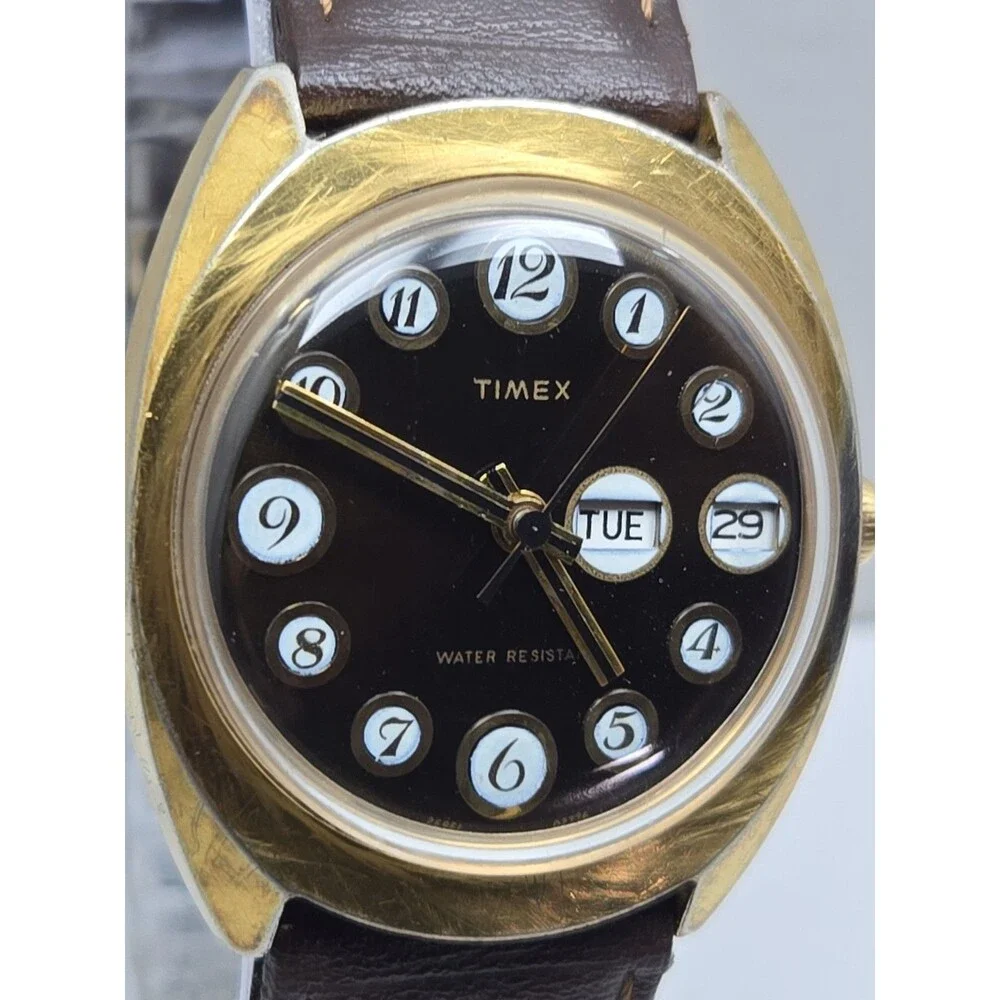 Vintage 1976 Timex Marlin Telephone Dial Day Date Hand Wind Gold Tone Mens Watch